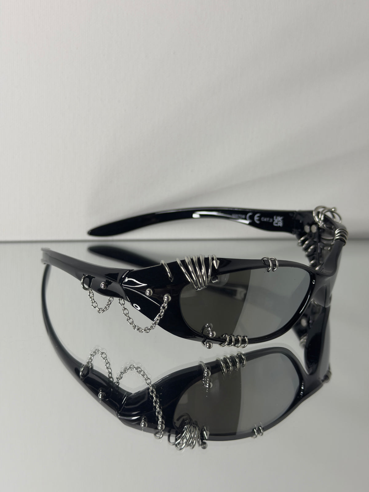 MIRRORED PIERCED RAVER